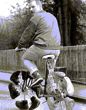 The Smart Guy riding a bicycle whose wheels are made of boots